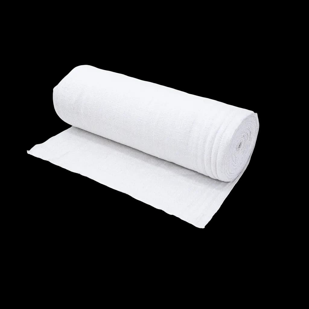 A roll of Termaltex C fabric, a white insulating material, partially unrolled.