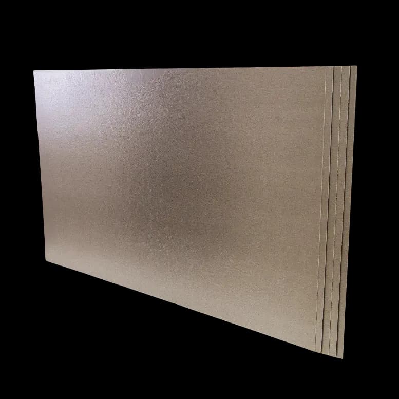 A stack of beige rectangular Rigimica boards with a smooth surface and a slight sheen.