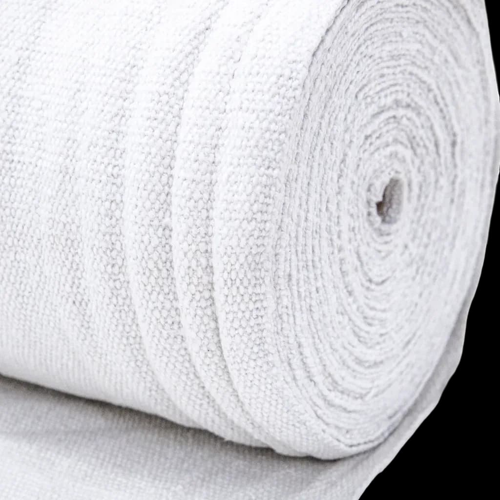 A roll of Termaltex H fabric, a white insulating material, partially unrolled.